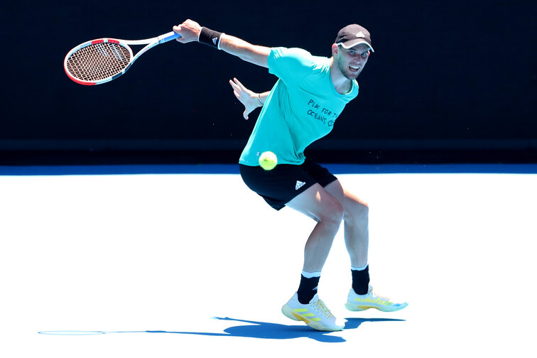 Dominic Thiem serves at an exhibition event before the Australian Open