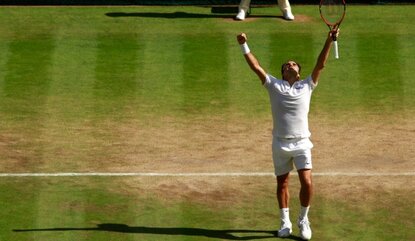 LONDON, ENGLAND - JULY 06: Roger Federer of Switzerland celebrates victory during the Men's Singles Quarter Finals match against Marin Cilic of Croatia on day nine of the Wimbledon Lawn Tennis Championships at the All England Lawn Tennis and Croquet...