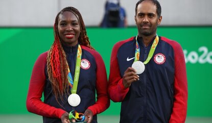 RIO DE JANEIRO, BRAZIL - AUGUST 14: Silver medalists Venus Williams and Rajeev Ram of the United States pose on the podium during the ceremony for the mixed doubles on Day 9 of the Rio 2016 Olympic Games at the Olympic Tennis Centre on August 14, 20...