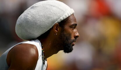RIO DE JANEIRO, BRAZIL - AUGUST 07: Dustin Brown of Germany in action against Thomaz Bellucci of Brazil in their first round match on Day 2 of the Rio 2016 Olympic Games at the Olympic Tennis Centre on August 7, 2016 in Rio de Janeiro, Brazil. (Phot...