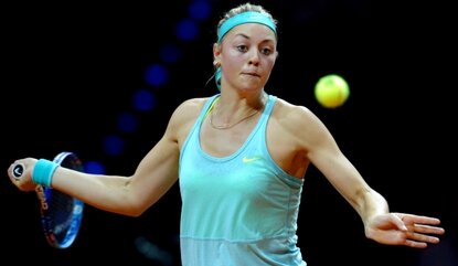 STUTTGART, GERMANY - APRIL 23: Carina Witthoeft of Germany returns during her match against Caroline Garcia of France on day four of the Porsche Tennis Grand Prix at Porsche-Arena on April 23, 2015 in Stuttgart, Germany. (Photo by Daniel Kopatsch/B...