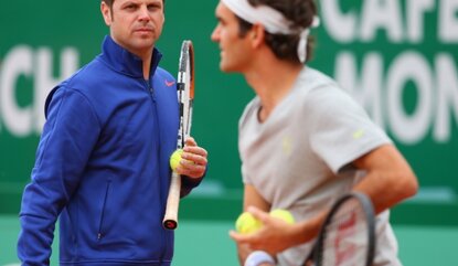 MONTE-CARLO, MONACO - APRIL 20: Severin Luthi, Switzerland Davis Cup captain watches on as finalists Roger Federer and Stanislas Wawrinka of Switzerland practice before the final during day eight of the ATP Monte Carlo Rolex Masters Tennis at Monte-...