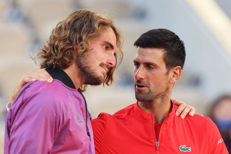 Stefanos Tsitsipas and Novak Djokovic at the French Open in Paris
