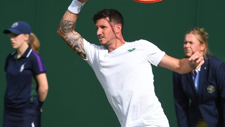 Dennis Novak is playing for a place in the main draw at Wimbledon today