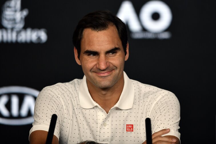 Roger Federer answers journalists' questions before his first round match at the Australian Open