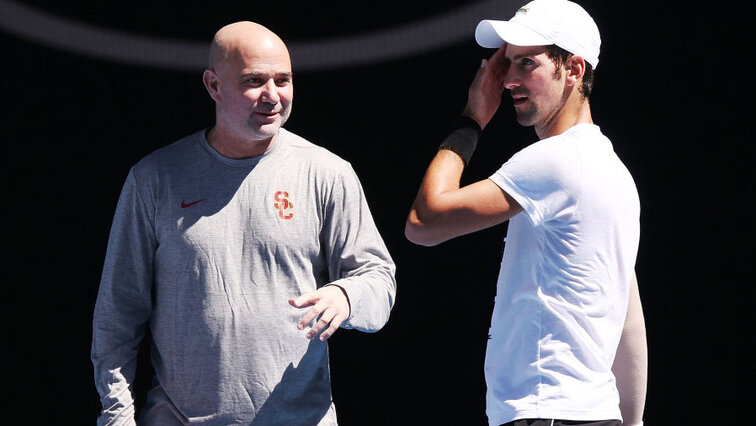 Andre Agassi with Novak Djokovic at the Australian Open 2018