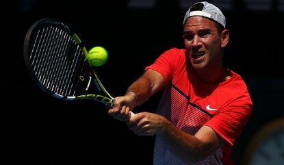 MELBOURNE, AUSTRALIA - JANUARY 19: Adrian Mannarino of France plays a backhand in his first round match against Sam Groth of Australia during day two of the 2016 Australian Open at Melbourne Park on January 19, 2016 in Melbourne, Australia. (Photo ...