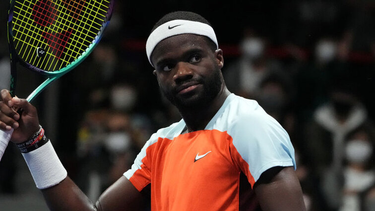 Frances Tiafoe continues to salute as the winner