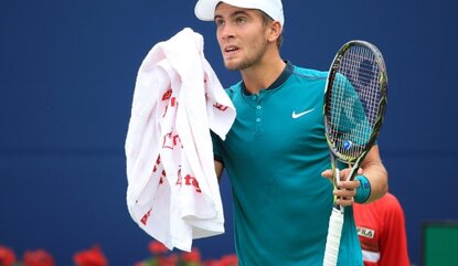 TORONTO, ON - JULY 25: Borna Coric of Croatia wipes his face as he plays against Ivan Dodig of Croatia during Day 1 of the Rogers Cup at the Aviva Centre on July 25, 2016 in Toronto, Ontario, Canada. (Photo by Vaughn Ridley/Getty Images)