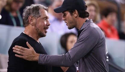 INDIAN WELLS, CA - MARCH 10: Entrepreneur Larry Ellison talks with Tommy Haas of Germany as they watch the tennis during day four of the BNP Paribas Open at Indian Wells Tennis Garden on March 10, 2016 in Indian Wells, California. (Photo by Julian ...