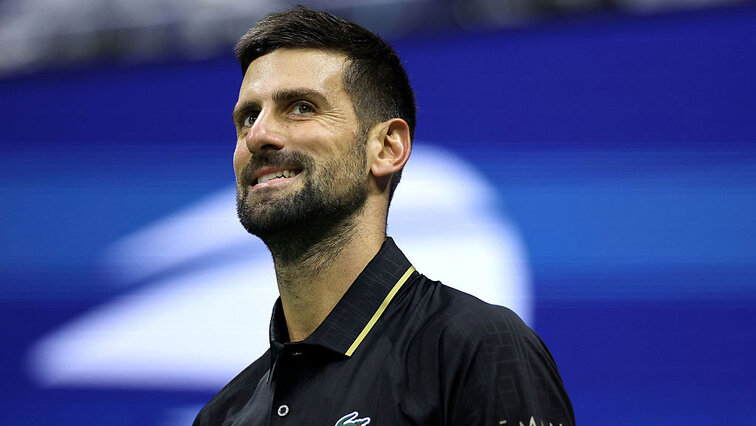 Novak Djokovic hat gut - und verschmitzt - lächeln Novak Djokovic hat gut - und verschmitzt - lächeln