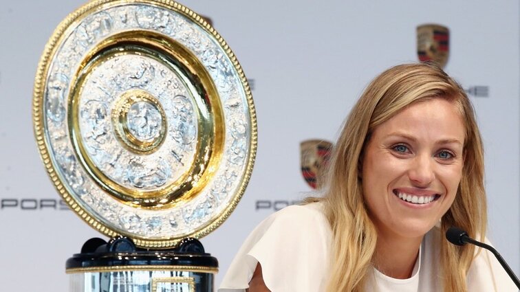 Angelique Kerber with the most important trophy of her career