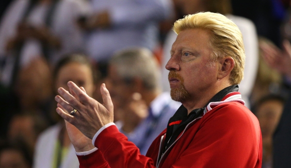 MELBOURNE, AUSTRALIA - JANUARY 31: Boris Becker, coach of Novak Djokovic, watches the Men's Singles Final match between Andy Murray of Great Britain and Novak Djokovic of Serbia during day 14 of the 2016 Australian Open at Melbourne Park on January ...