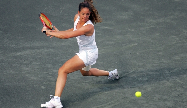 CHARLESTON, SC - APRIL 11: Patty Schnyder of Switzerland hits a return in her match against Shuai Peng of China during the Family Circle Cup at the Family Circle Tennis Center in Charleston, South Carolina. (Photo by Andy Lyons/Getty Images)