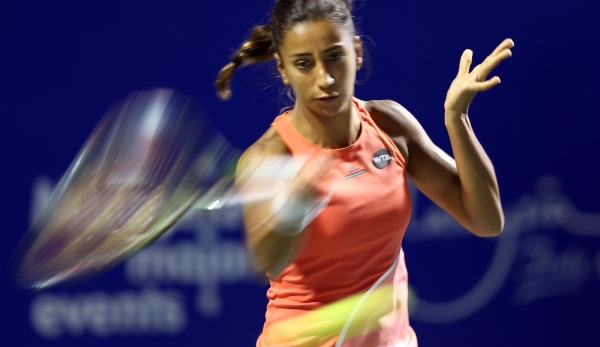 KUALA LUMPUR, MALAYSIA - MARCH 04: Cagla Buyukakcay of Turkey plays a return shot to Eugenie Bouchard of Canada during the Quarter Finals of the 2016 BMW Malaysian Open at Kuala Lumpur Golf & Country Club on March 4, 2016 in Kuala Lumpur, Malaysia. ...