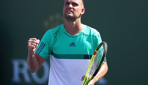 INDIAN WELLS, CA - MARCH 11: Mikhail Youzhny of Russia celebrates winning a game in his match against Aljaz Bedene of Great Britain during day five of the BNP Paribas Open at Indian Wells Tennis Garden on March 11, 2016 in Indian Wells, California. ...