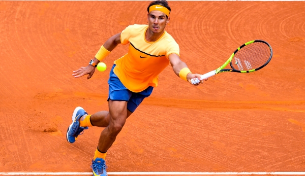 BARCELONA, SPAIN - APRIL 21: Rafael Nadal of Spain plays a forehand against Albert Montanez during day four of the Barcelona Open Banc Sabadell at the Real Club de Tenis Barcelona on April 21, 2016 in Barcelona, Spain. Nadal won 6-2, 6-2. (Photo by...