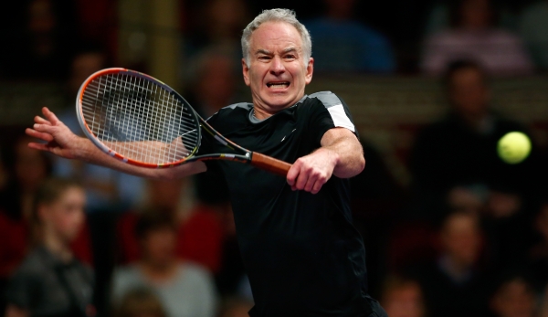 LONDON, ENGLAND - DECEMBER 05: John McEnroe of the USA plays a backhand during his Tie Break Tens singles match against Tim Henman of Great Britain during day four of the Statoil Masters Tennis at the Royal Albert Hall on December 5, 2015 in London,...