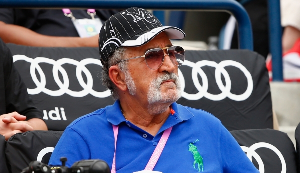 INDIAN WELLS, CA - MARCH 22: Ion Tiriac watches Simona Halep of Romania against Jelena Jankovic of Serbia in the final during day fourteen of the BNP Paribas Open tennis at the Indian Wells Tennis Garden on March 22, 2015 in Indian Wells, California...