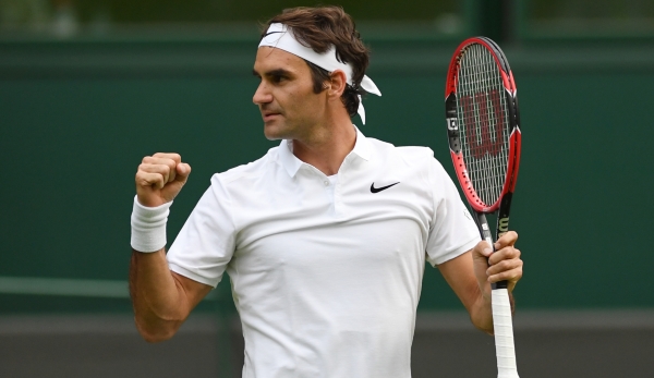 LONDON, ENGLAND - JUNE 27: Roger Federer of Switzerland celebrates victory following the Men's Singles first round against Giodo Pella of Argentina on day one of the Wimbledon Lawn Tennis Championships at the All England Lawn Tennis and Croquet Clu...