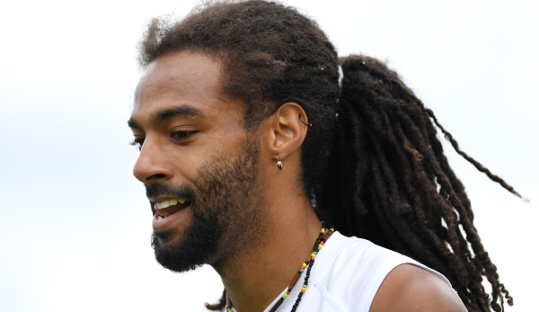 LONDON, ENGLAND - JUNE 28: Dustin Brown of Germany looks on during the Men's Singles first round match against Dusan Lajovic of Serbia on day two of the Wimbledon Lawn Tennis Championships at the All England Lawn Tennis and Croquet Club on June 28, ...