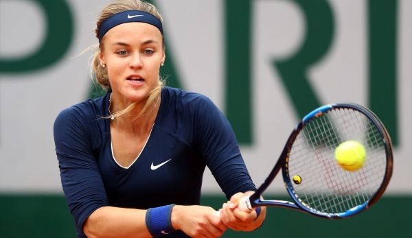 PARIS, FRANCE - MAY 23: Anna Karolina Schmiedlova of Slovakia hits a backhand during the Ladies Singles first round match against Garbine Muguruza of Spain on day two of the 2016 French Open at Roland Garros on May 23, 2016 in Paris, France. (Photo...