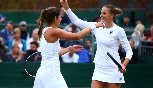 LONDON, ENGLAND - JULY 04: Julia georges of Germany and Karolina Pliskova of The Czech Republic celebrates victory during the Ladies doubles third round match against Heather Watson of Great Britain and Naomi Broady of Great Britain on day seven of ...