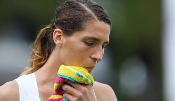 LONDON, ENGLAND - JUNE 30: Andrea Petkovic of Germany looks dejected during the Ladies Singles second round match against Elena Vesnina of Russia on day four of the Wimbledon Lawn Tennis Championships at the All England Lawn Tennis and Croquet Club ...
