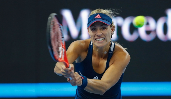 BEIJING, CHINA - OCTOBER 05: Angelique Kerber of Germany returns a shot against Barbora Zahlavova Strycova of the Czech Republic during the Women's singles second round match on day five of the 2016 China Open at the China National Tennis Centre on ...