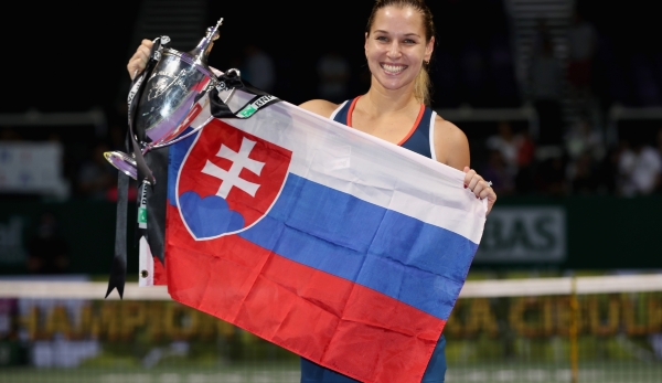 SINGAPORE - OCTOBER 30: Dominika Cibulkova of Slovakia poses with the trophy after victory in her singles final against Angelique Kerber of Germany during day 8 of the BNP Paribas WTA Finals Singapore at Singapore Sports Hub on October 30, 2016 in S...