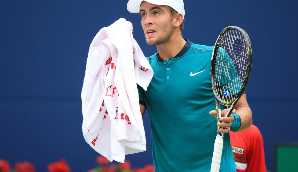 TORONTO, ON - JULY 25: Borna Coric of Croatia wipes his face as he plays against Ivan Dodig of Croatia during Day 1 of the Rogers Cup at the Aviva Centre on July 25, 2016 in Toronto, Ontario, Canada. (Photo by Vaughn Ridley/Getty Images)