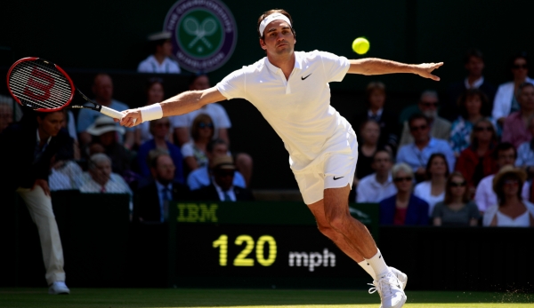 LONDON, ENGLAND - JULY 06: Roger Federer of Switzerland plays a forehand during the Men's Singles Quarter Finals match against Marin Cilic of Croatia on day nine of the Wimbledon Lawn Tennis Championships at the All England Lawn Tennis and Croquet C...