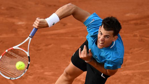 Dominic Thiem had to stretch against Tommy Paul